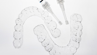 Smile compared with teeth shading chart